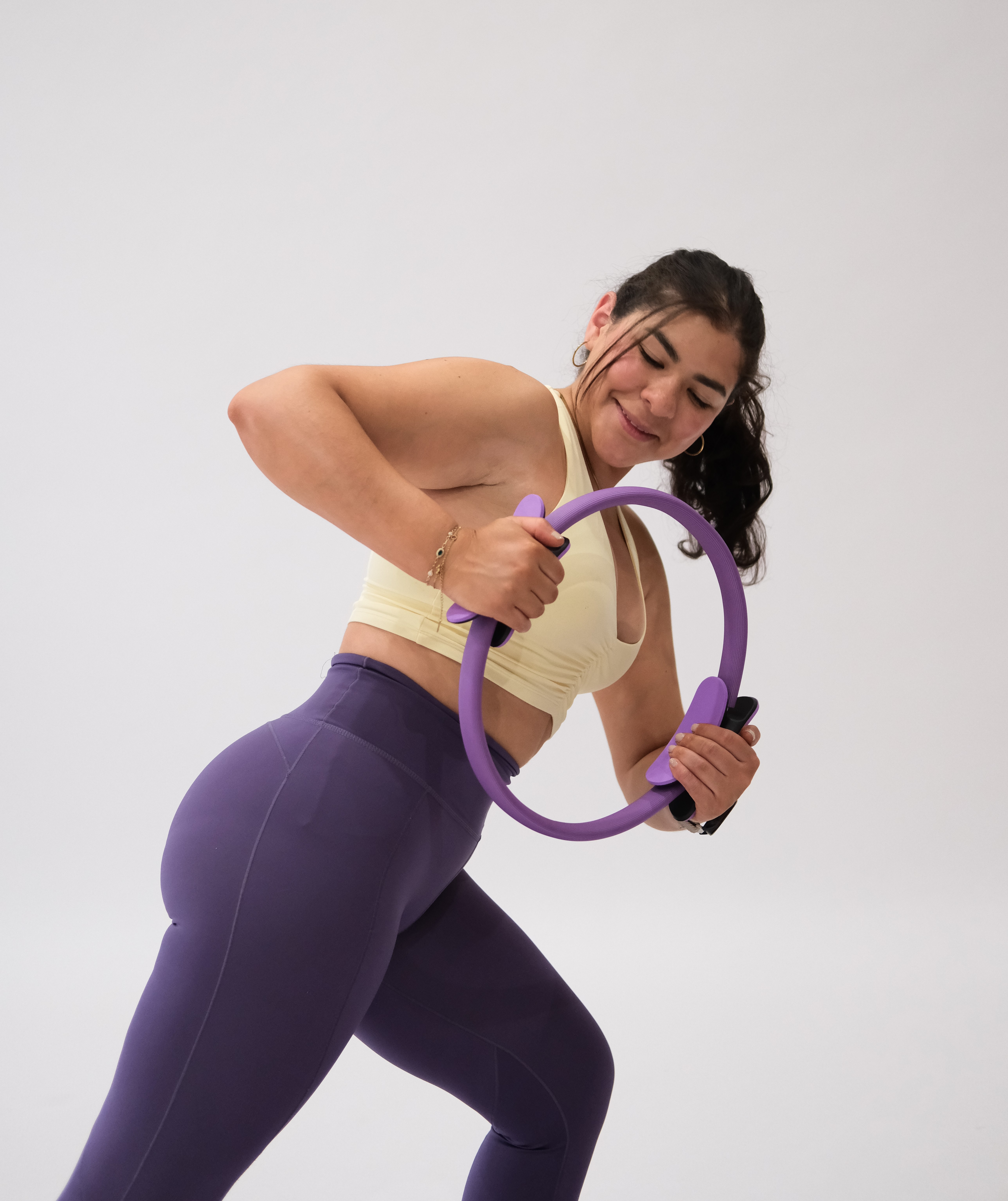 Valeria demonstrating a Pilates exercise