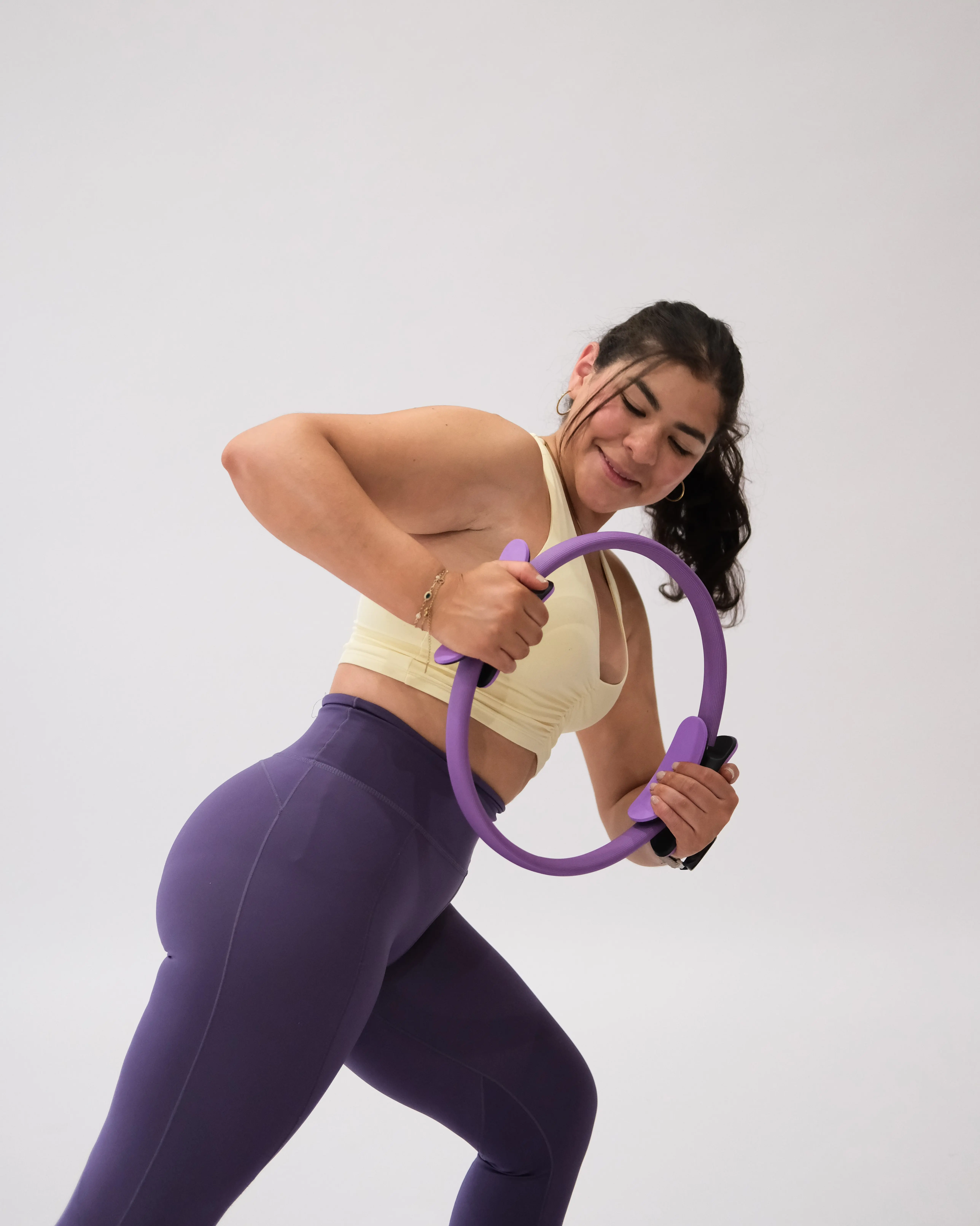 Valeria demonstrating a Pilates exercise